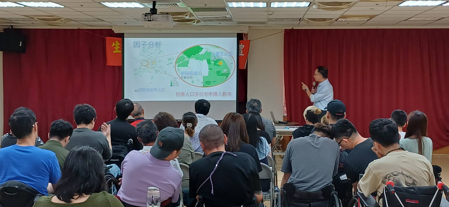 新北市政府主計處於脊損傷中心演講AI應用得獎案例-新北主計處提供。